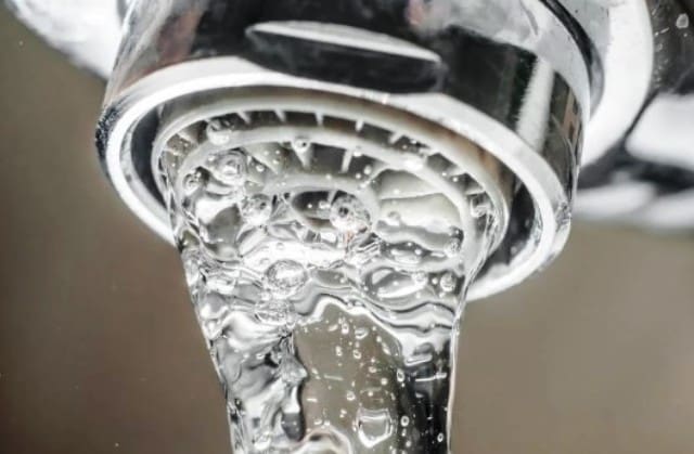 Water Flowing out of Tap