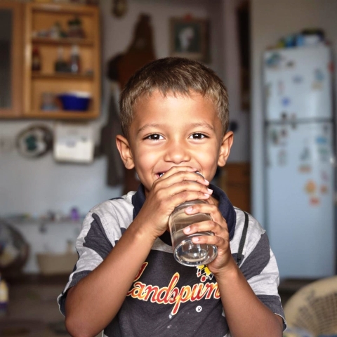 Boy drinking clean safe water