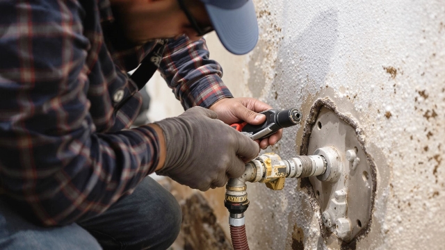 Handy man fixing water damage
